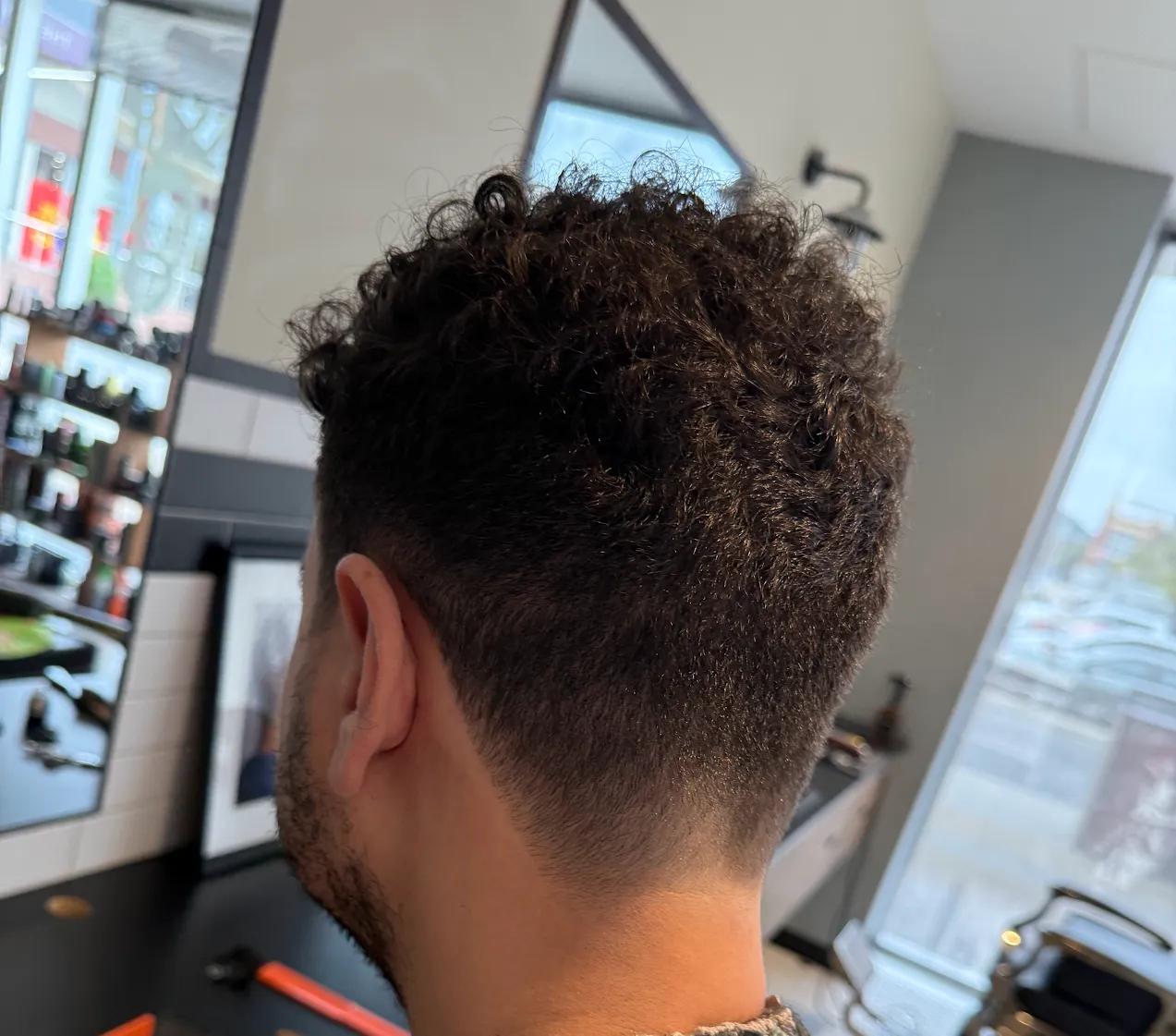 Curly tops combined with a skin fade Curly tops combined with a skin fade